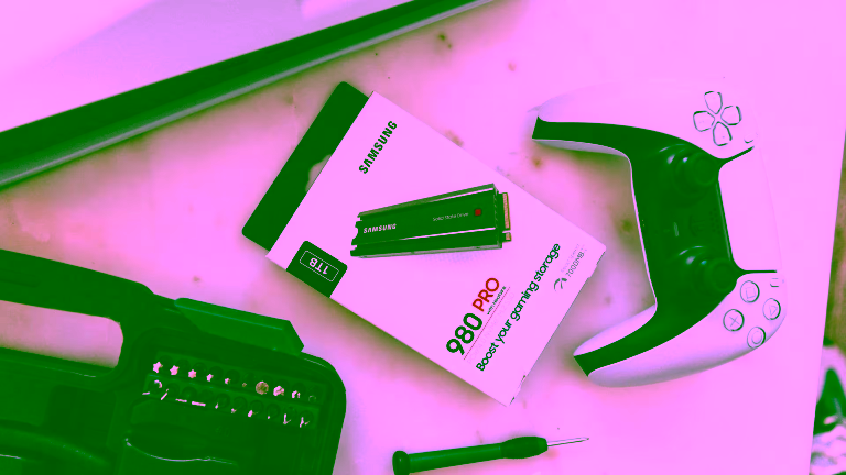 Samsung 980 PRO SSD next to PS5 controller and tools, ready for console storage upgrade.