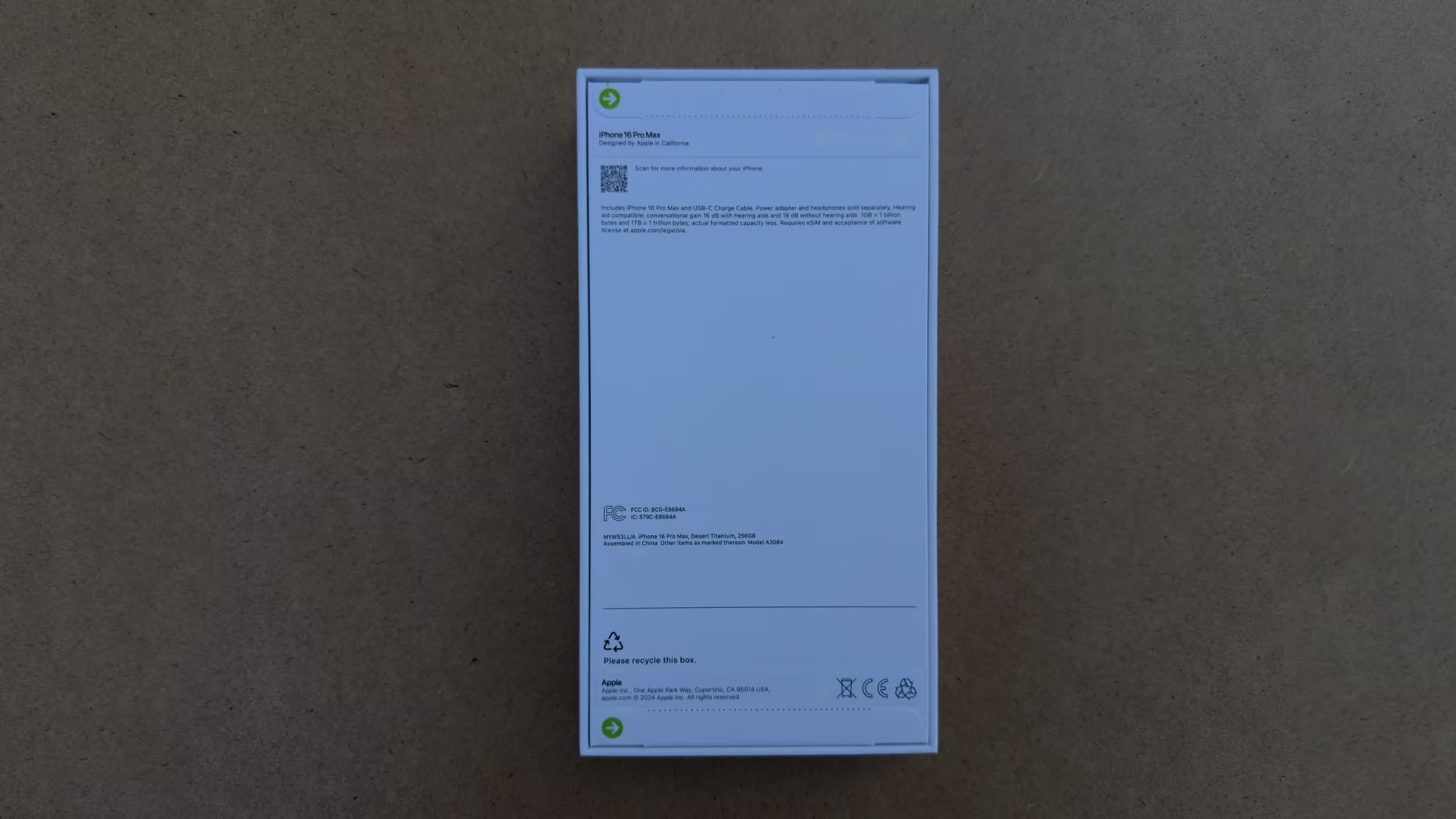 Back view of the iPhone 16 Pro Max retail box showing technical details and regulatory information.