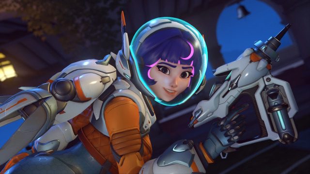 Overwatch 2 hero Juno wearing a futuristic space suit with a glowing helmet and sci-fi blaster