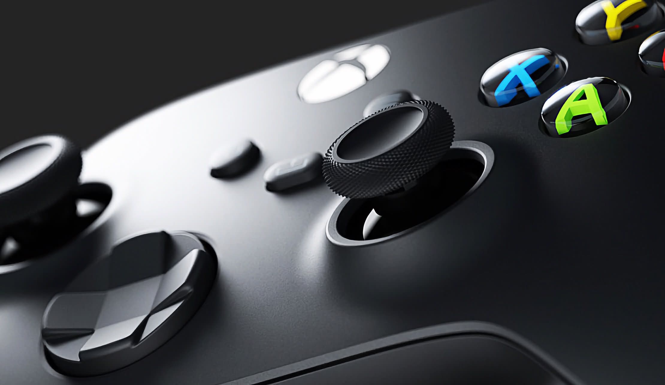 Close-up view of a black Xbox Series wireless controller, focusing on the right joystick and face buttons.